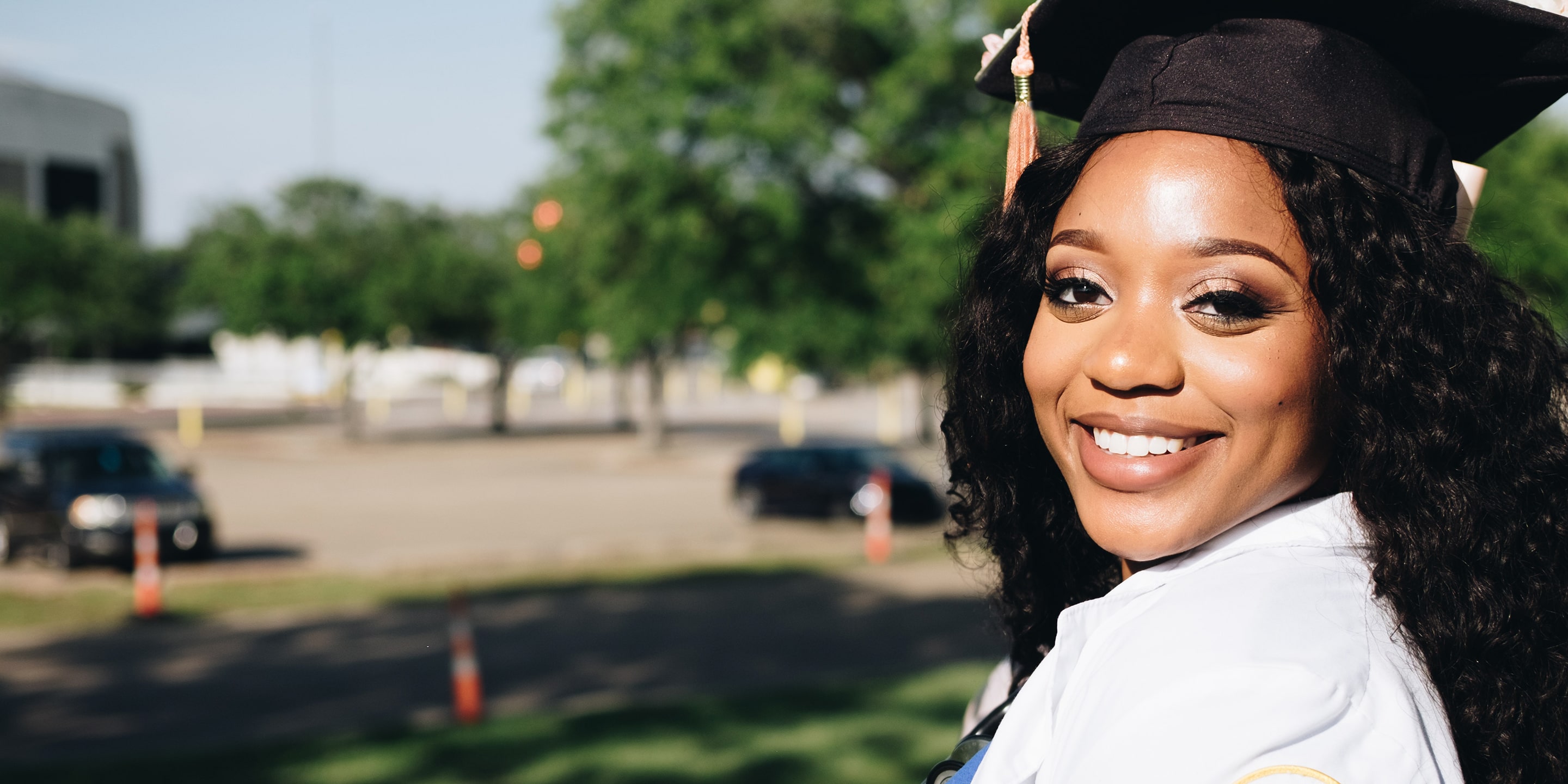 Smiling new female graduate