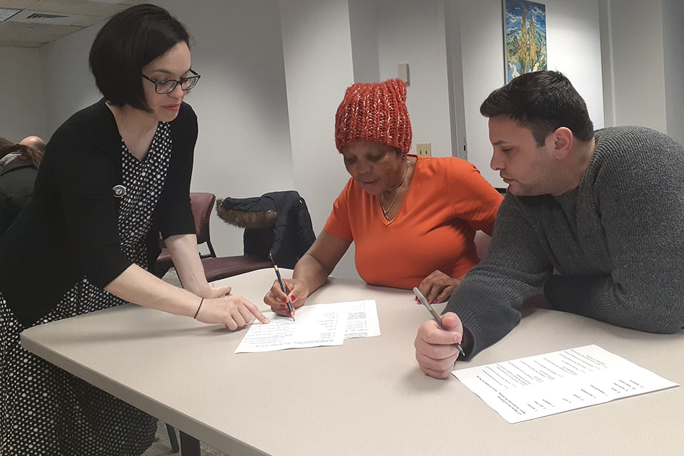 Compass  AmeriCorps member Katie teaching English language learners