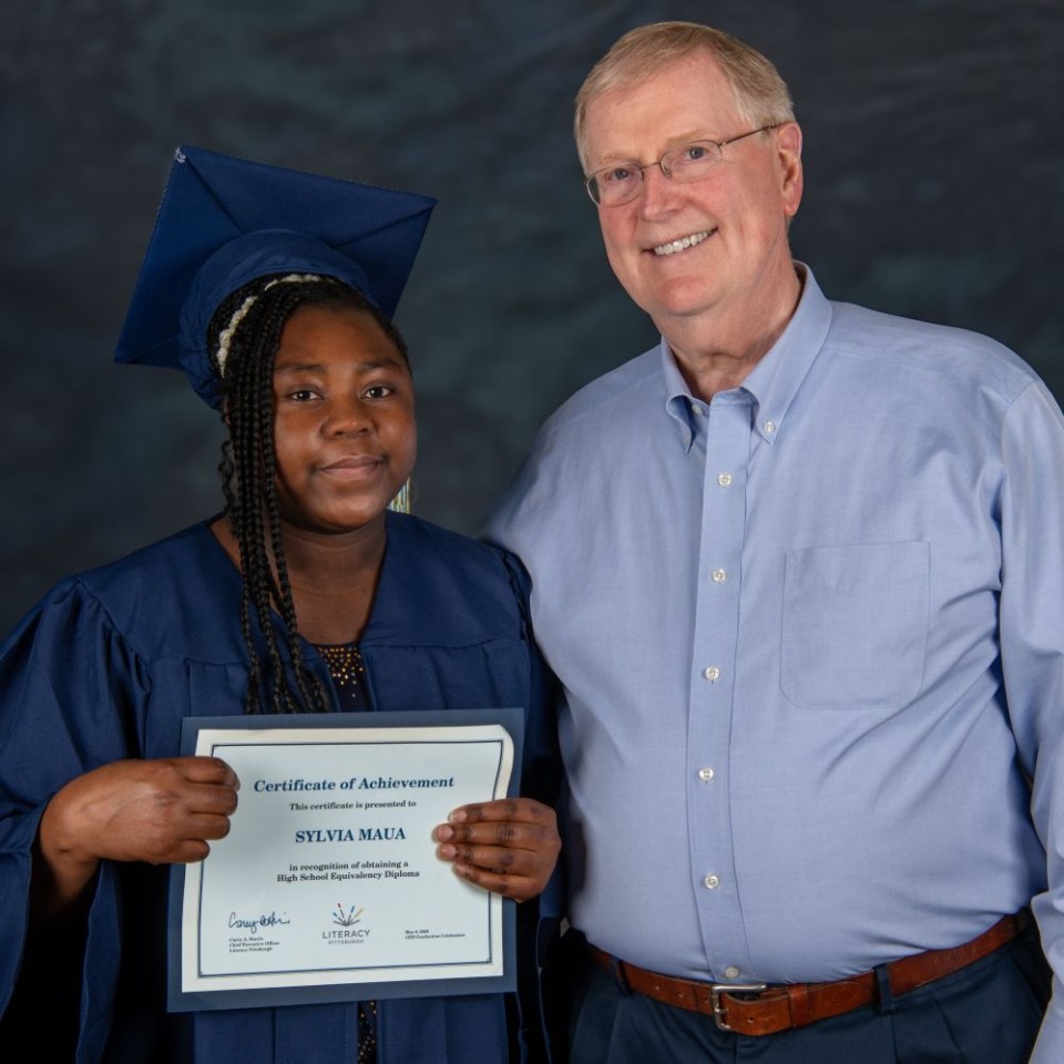Volunteer GED tutor Henry and student Sylvia