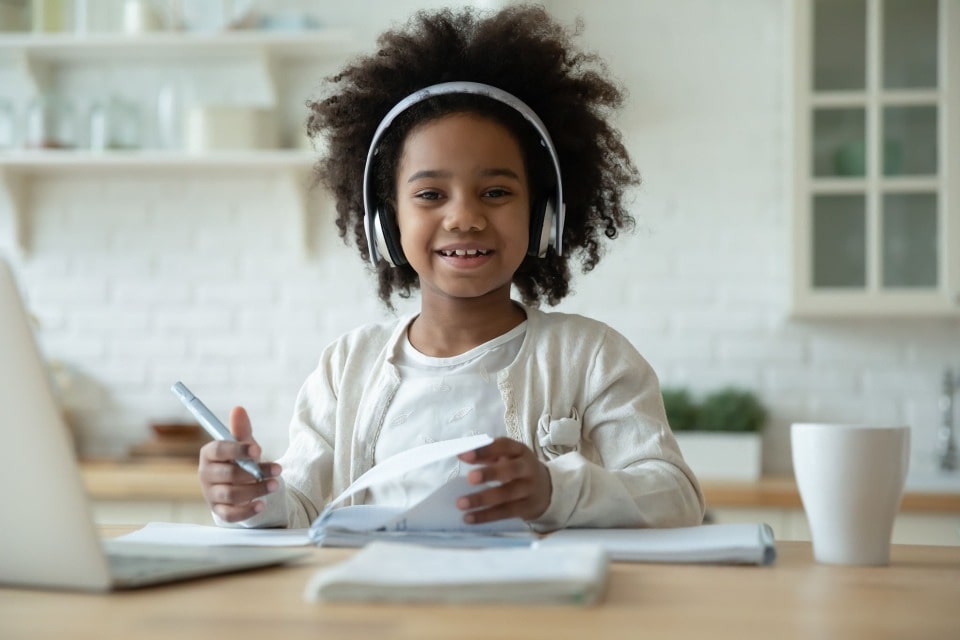 Young girl does schoolwork