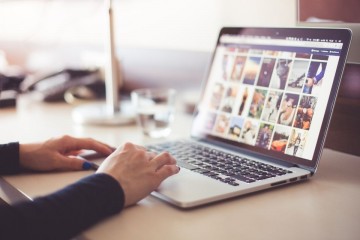 female student learns digital literacy on a laptop